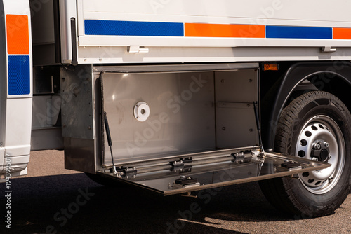 Fotografija Open storage compartment on specialized service truck.