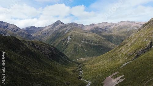 Aerial drone view of mountain valley and river in Arthurs Pass National Park, New Zealand