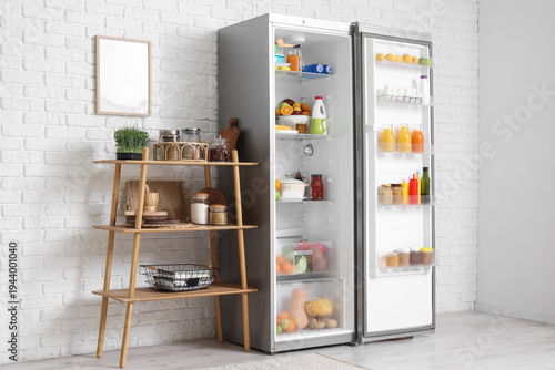 Open fridge full of differe...