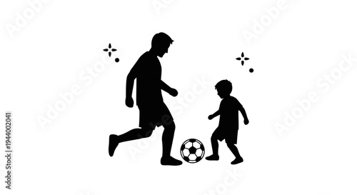 Man and child playing soccer together.