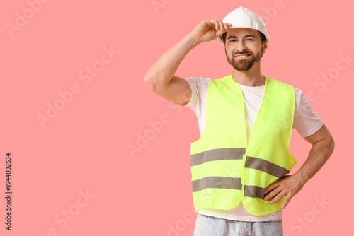 Young happy male constructi...