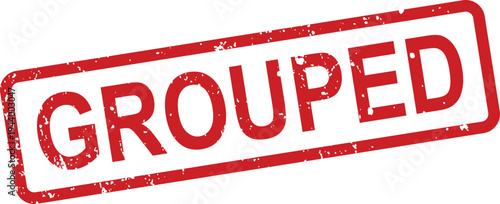 A distressed red rubber stamp clearly presenting the word GROUPED on a pristine white surface