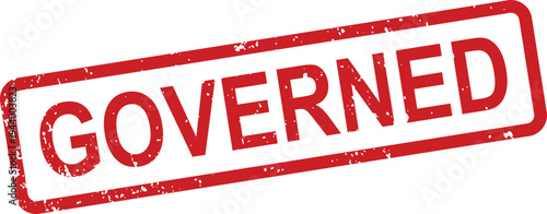 A distressed red rubber stamp featuring the prominent word GOVERNED displayed on a clean white surface