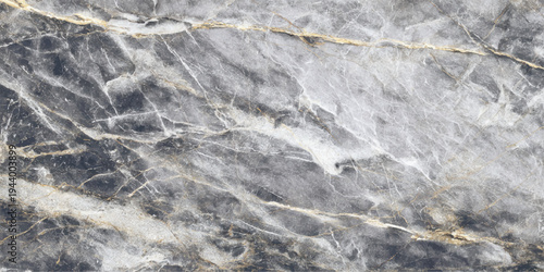 A rough gray stone wall texture showcases an old grunge rock surface pattern with a weathered material detail that creates a perfect natural backdrop