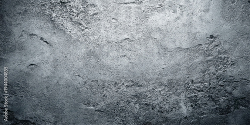 A rough gray grunge metal texture on an old dirty stone wall surface creates a weathered concrete backdrop with a dark rock pattern and a macro material design
