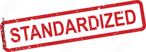 A prominent red rectangular rubber stamp features the word STANDARDIZED with a textured, worn appearance