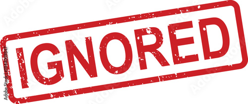 A rectangular grunge textured red rubber stamp with the word IGNORED embossed prominently on a white surface