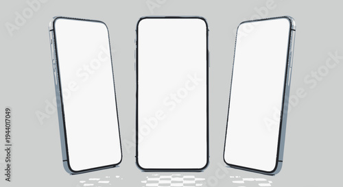 Three smartphones with blank screens on gray background
