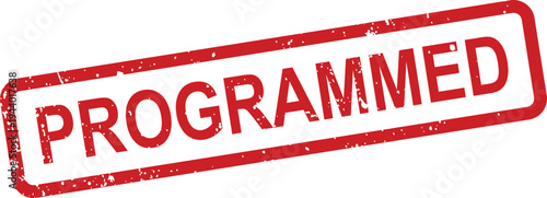 A red grunge textured rubber stamp displays the word Programmed against a clean white backdrop