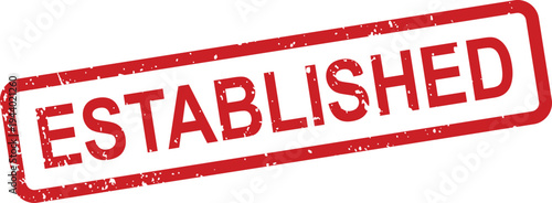 A red rectangular rubber stamp with a distressed grunge texture displays the word ESTABLISHED prominently
