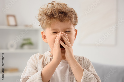Sick little boy suffering f...