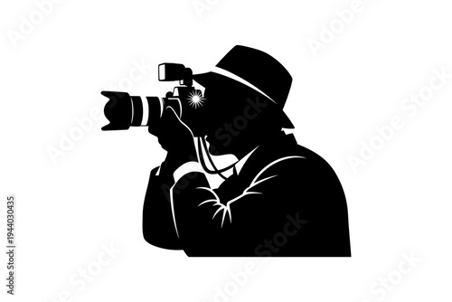 Silhouette of photographer capturing moment in black and white