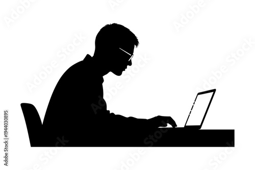 Silhouette of man typing on laptop: remote work and digital nomad lifestyle