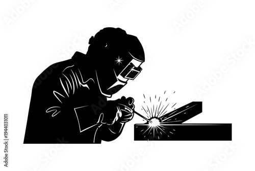 Silhouette of welder working on metal welding project in black and white