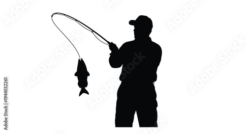 Silhouette of a fisherman holding a fish on a fishing rod