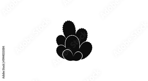 Silhouette of a cluster of berries against a plain background