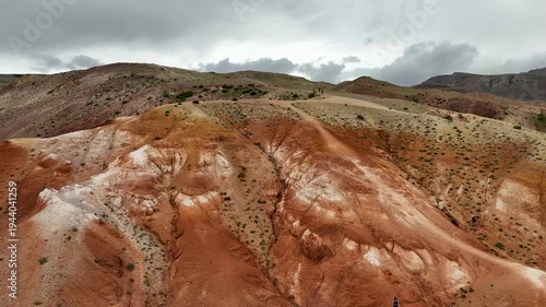Aerial view Tourist on Altai landscape republic Russia. Red color sand and clay Mars Altay.