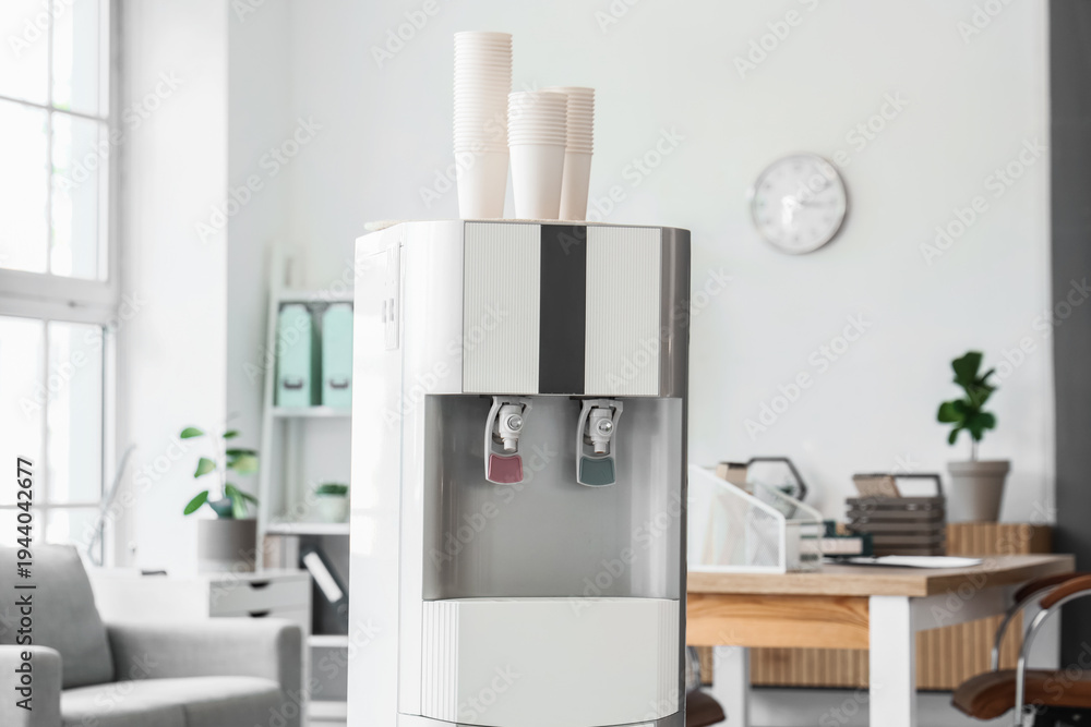Fototapeta premium Modern water cooler in light office