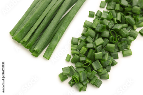 Slices of fresh green onion on white background