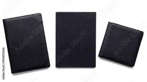 фотографія three black leather binders and a small black leather wallet on a transparent background, top view