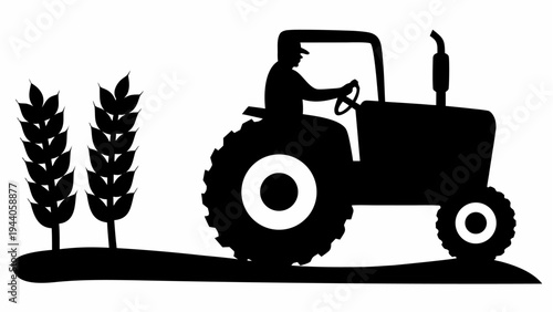 Farmer driving tractor through wheat field at sunset silhouette landscape