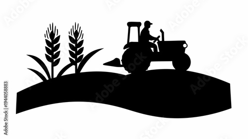 Farmer driving tractor in wheat field at sunset silhouette landscape