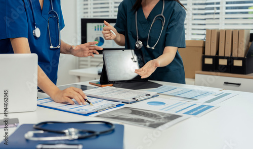 Medical, meeting and laptop for team in office in discussion, brainstorming and planning. Doctor, nurse and computer on desk, teamwork or workshop for data analytics.
