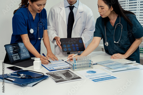 Medical Team Analyzes Patient Information and Medication Chart.