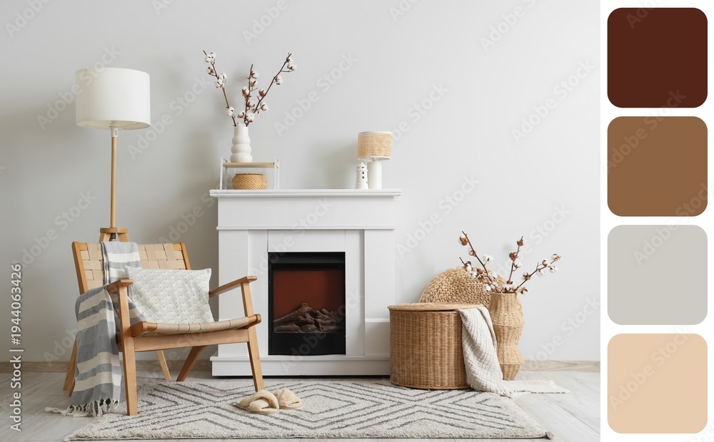 Obraz premium Fireplace, armchair, wicker basket and vases with cotton flowers in interior of living room. Different color patterns