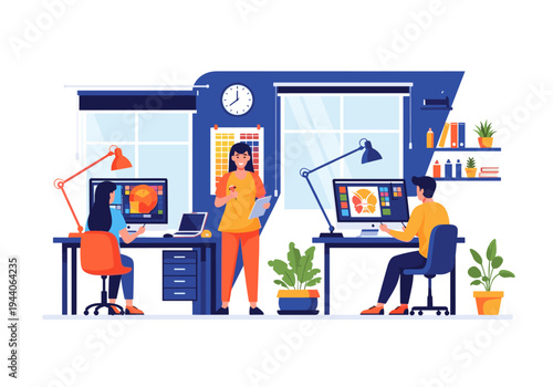 Graphic designers collaborating on a creative project in a modern office workspace