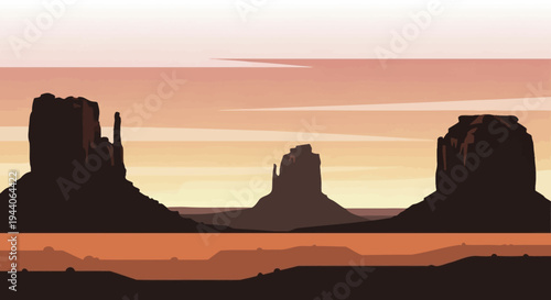 Iconic Monument Valley Mittens Rock Formations at Sunset.