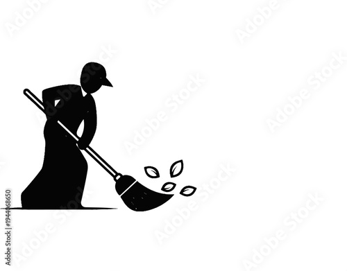 Silhouette of a person wearing a cap, sweeping scattered leaves with a broom