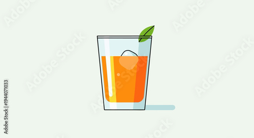 Refreshing Orange Juice in a Clear Glass with Mint Leaf.