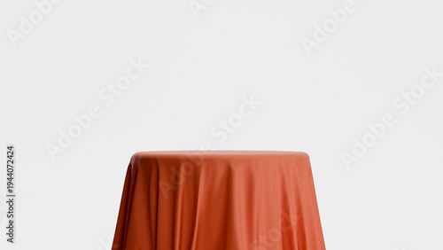 round table is covered by a vibrant orange cloth in a simple indoor area. setting is bright, and the table waits for food, drinks, or decorations for an event. 3d render