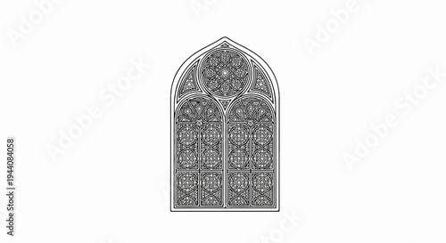 Intricate gothic window with ornate tracery and quatrefoil design
