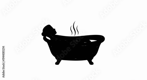 Silhouette of a person relaxing in a steaming bathtub