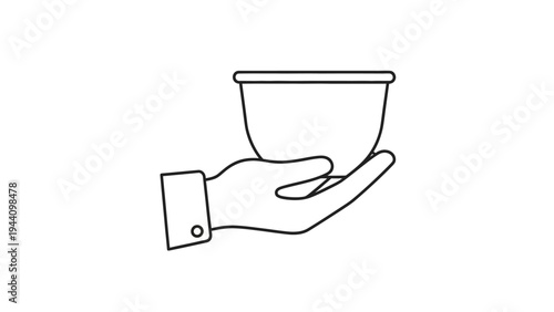 Hand holding empty small bowl.