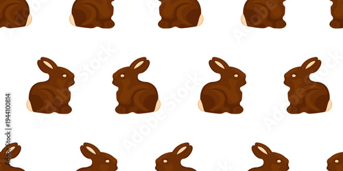 Seamless pattern with chocolate Easter bunnies on a white background for textile, fabric, wrapping paper. 