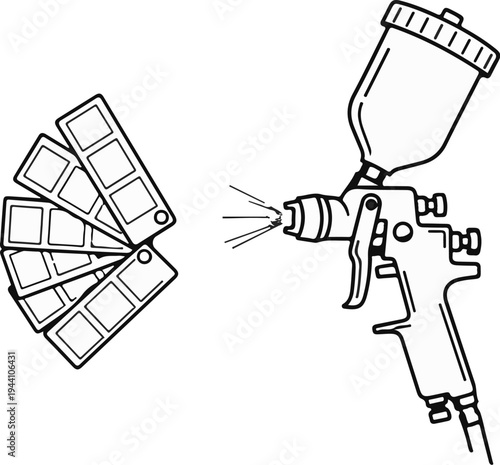 A spray gun and fanned swatch cards, representing paint colors