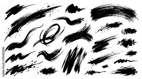 Abstract black brush strokes on white background showcasing various artistic designs and textures