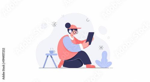 Person with headphones and tablet sitting with a cup of coffee