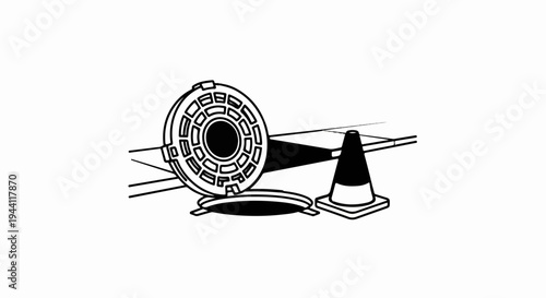 Open manhole cover with a traffic cone on the street