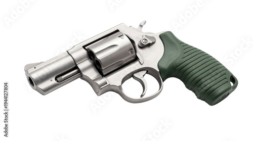 Schilderij op canvas Modern silver revolver with a textured green polymer grip, a powerful and compac