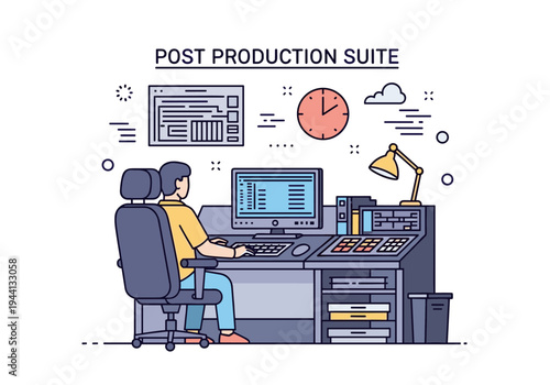 Man working in a post production suite with computer and editing equipment