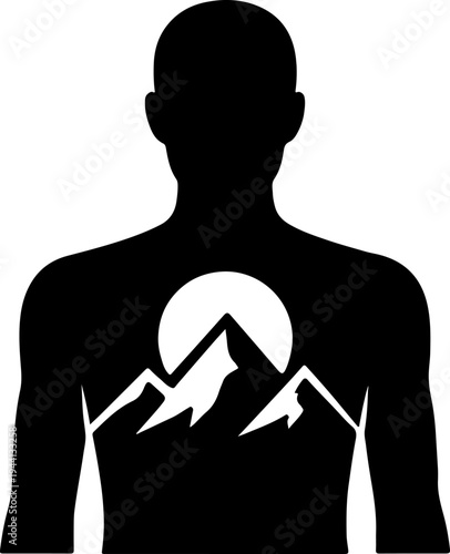 A man's silhouette stands against a mountain landscape with a sun