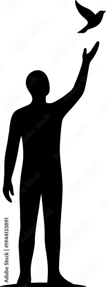 Fototapeta premium Man releases bird from his outstretched hand in the air