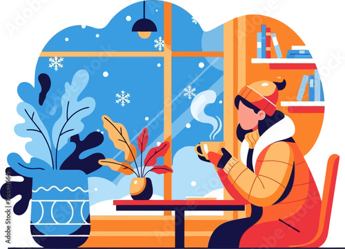 Young woman sips a hot beverage while watching snow fall from a cafe