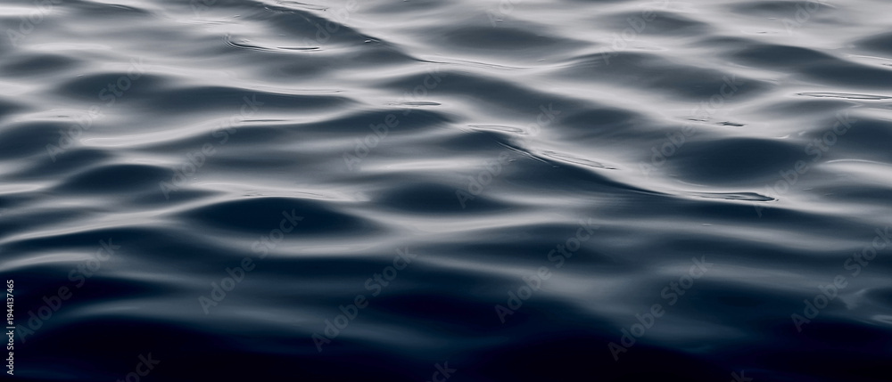 Obraz premium Abstract Blue Water Ripples Texture Background