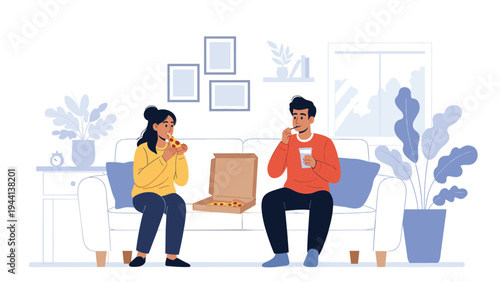 Young couple enjoys a casual meal together while sitting on a comfortable white sofa and eating delicious pizza from a cardboard box.