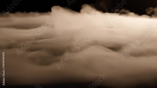 Thick, low-lying theatrical smoke fog rolling across surface in sepia tones, for mystery, dramatic atmosphere, supernatural event